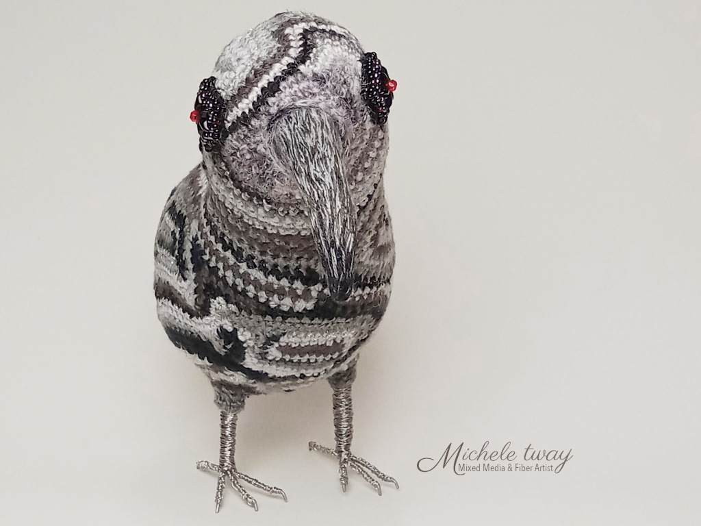 Echo a mixed media bird sculpture by Michele Tway