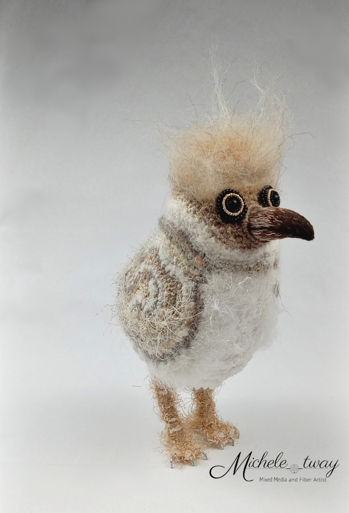 Sylvester, a mixed media bird sculpture by Michele Tway.