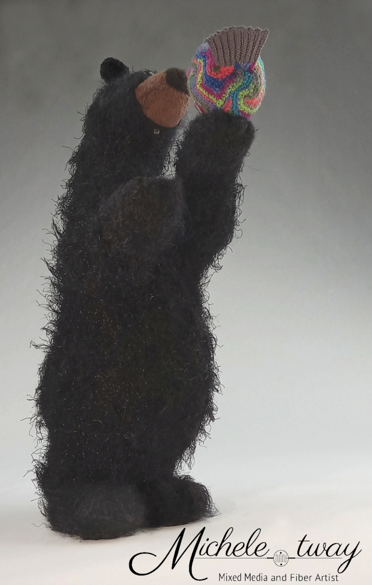 Crochet bear and bird sculpture by Michele Tway.