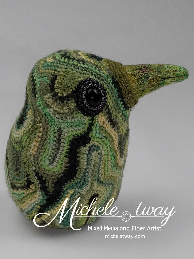 Mixed media and free-form crochet bird sculpture entitled Forest by Michele Tway.