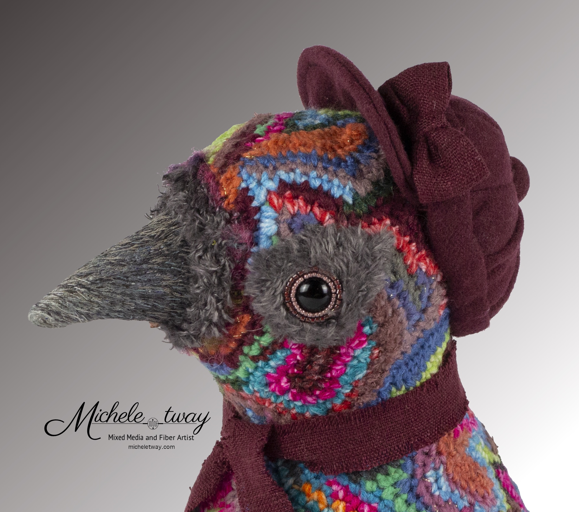 Maya, a citrus-themed, bird sculpture by Michele Tway.