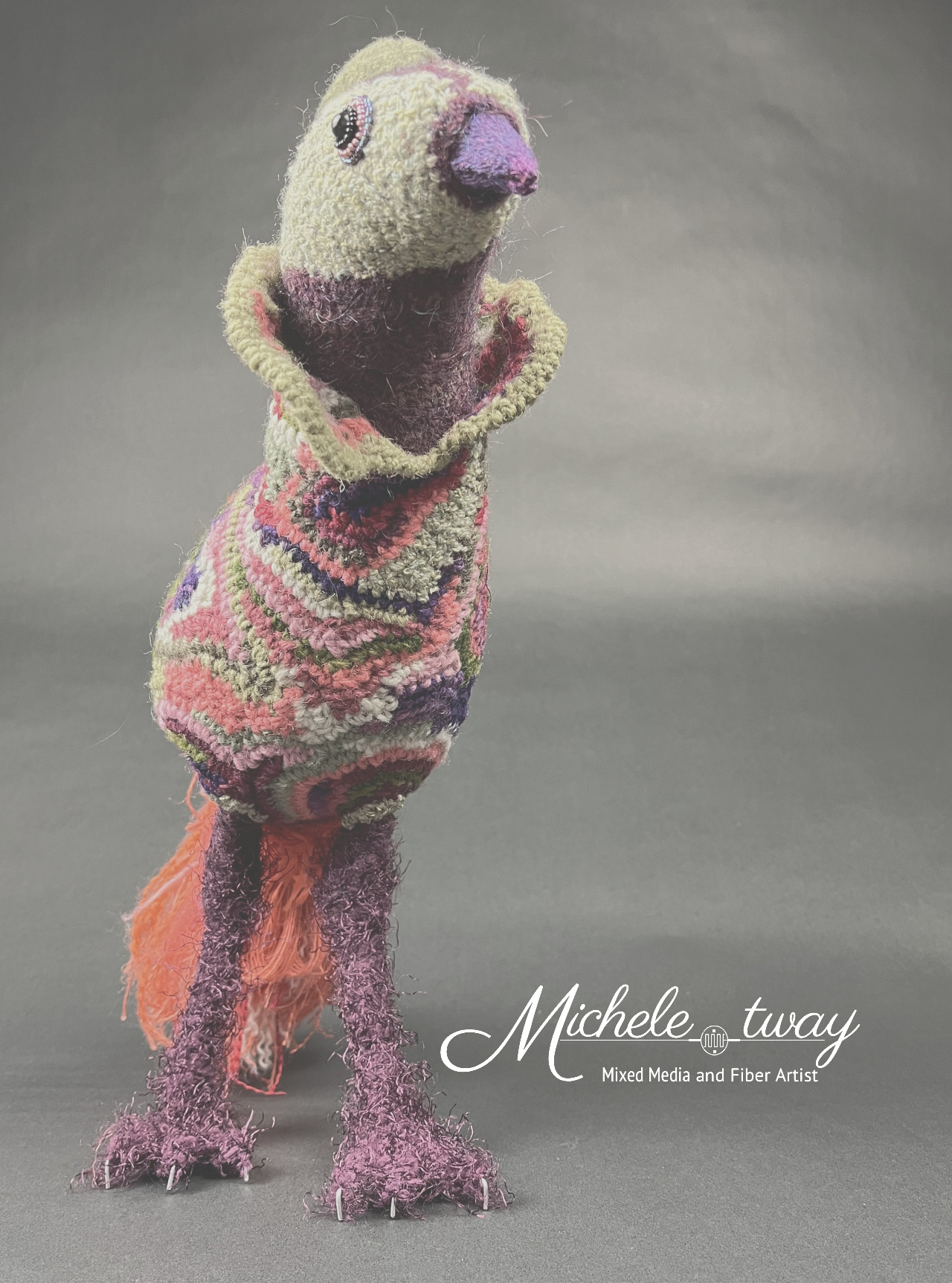 Sherwood's looking at you and loving what he sees; a fiber art sculpture by Michele Tway.